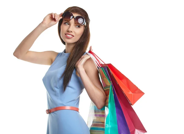 Belle femme avec des sacs à provisions — Photo