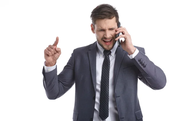 Zakenman zenuwachtig praten over de telefoon — Stockfoto