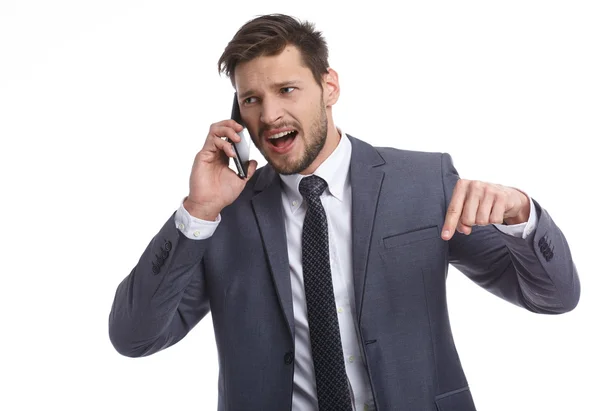 Der emotionale junge Mann telefoniert. das menschliche Gesicht, exp. — Stockfoto