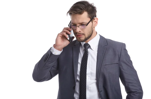 Businessman nervously talking on the phone — Stock Photo, Image