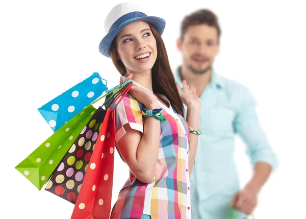 Pareja con bolsas de compras — Foto de Stock