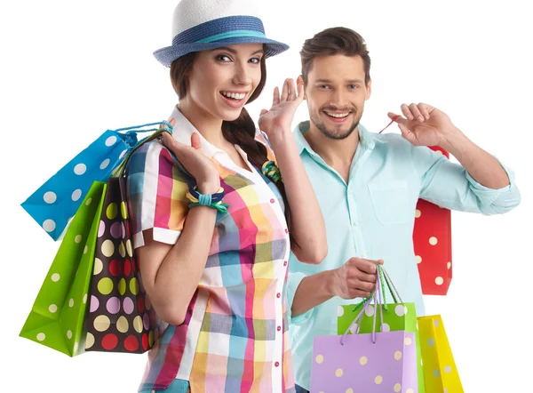 Pareja con bolsas de compras — Foto de Stock