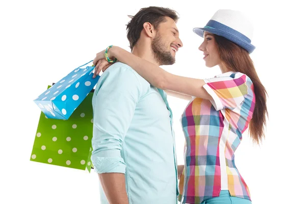 Pareja con bolsas de compras —  Fotos de Stock