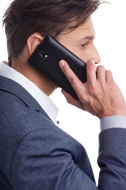 cep telefonuyla konuşan işadamı