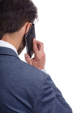 cep telefonuyla konuşan işadamı
