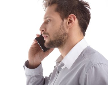 cep telefonuyla konuşan işadamı
