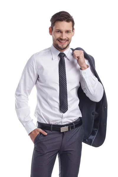 Elegante joven hombre sosteniendo chaqueta — Foto de Stock