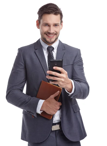 Hombre de negocios con teléfono y carpetas —  Fotos de Stock