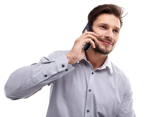 Jovem feliz usando telefone celular — Fotografia de Stock