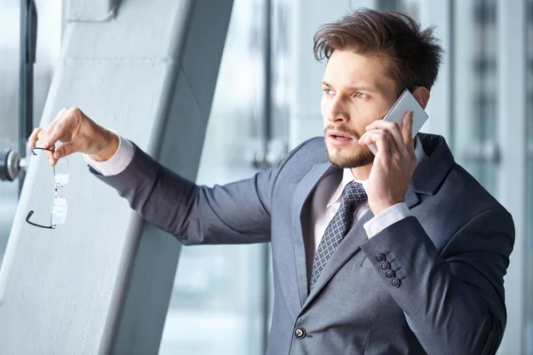 Handsome businessman on the phone — Stock Photo, Image