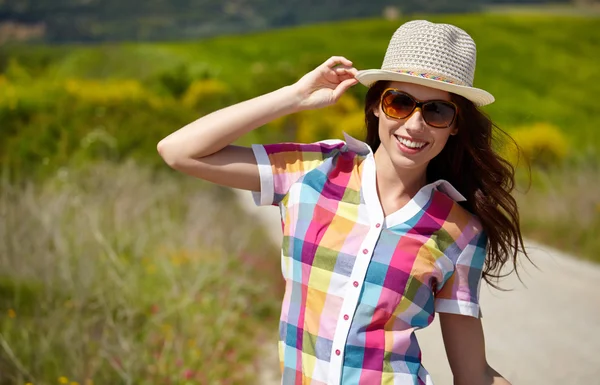 Woman with hat and sunglasses — Stock Photo, Image