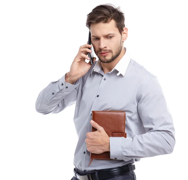 Young man talking on mobilephone — Stock Photo, Image