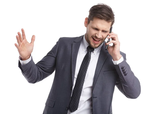 Businessman in suit using mobile phone — Stock Photo, Image