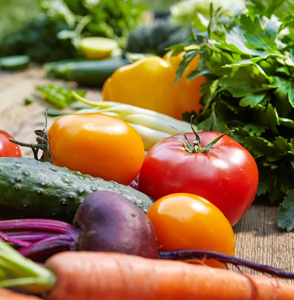 Vegetables on wooden table — Stock Photo, Image