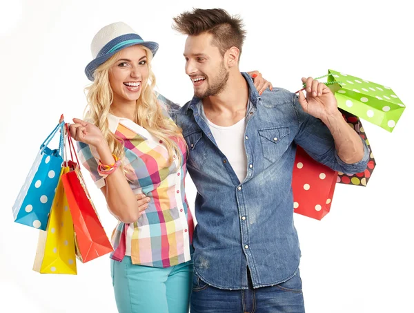 Pareja con bolsas de compras — Foto de Stock