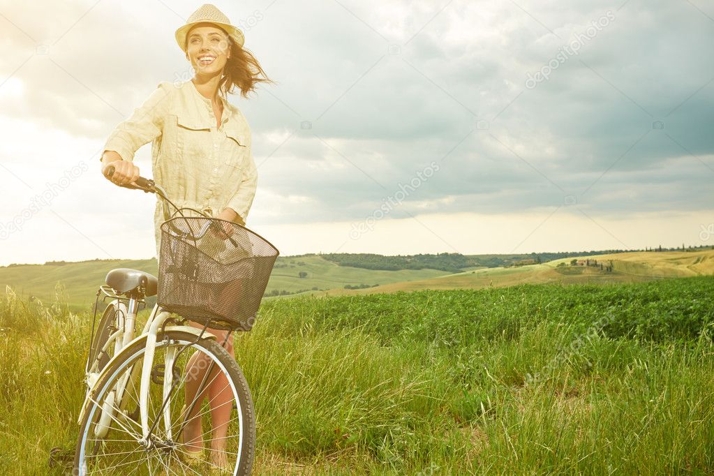 vintage girl next to bike