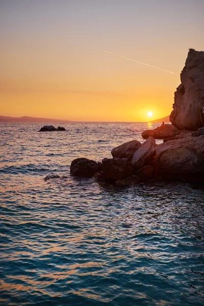 Rock island při západu slunce — Stock fotografie
