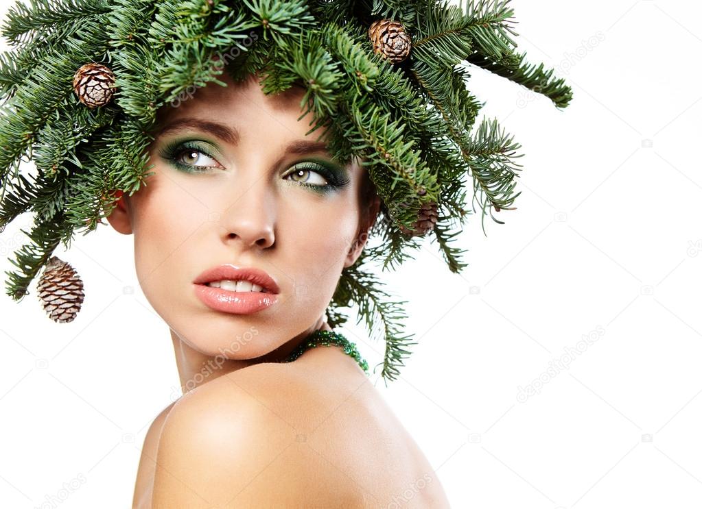 Beautiful woman in creative christmas decoration