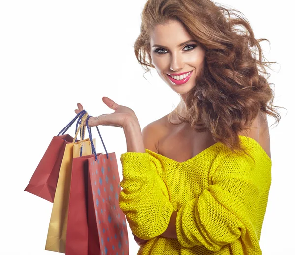 Mujer sosteniendo bolsas —  Fotos de Stock