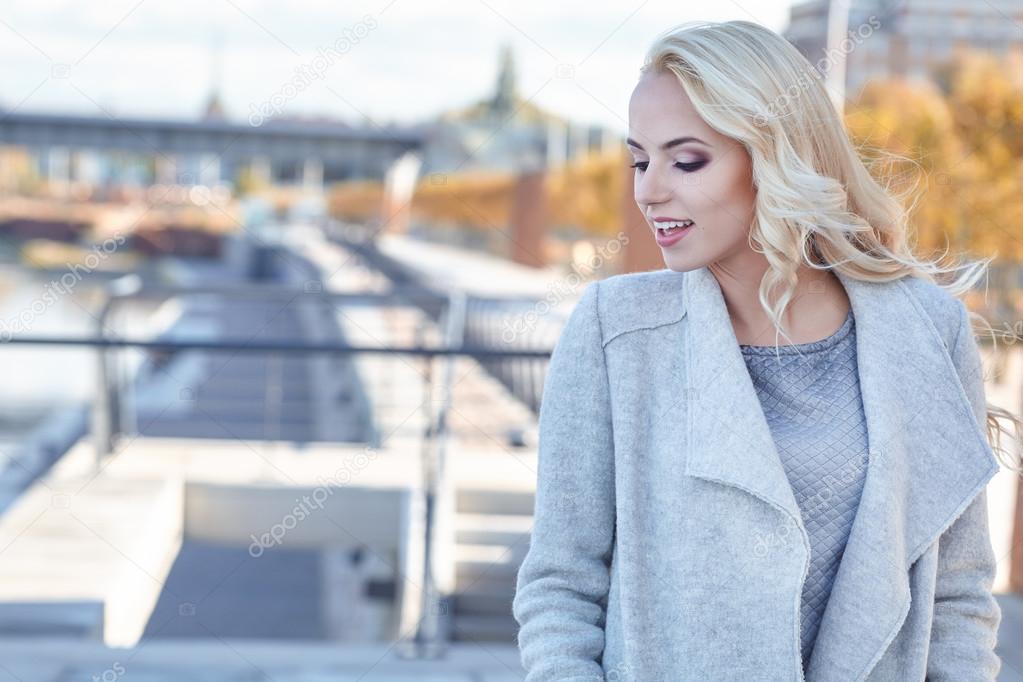 blond woman in autumn color