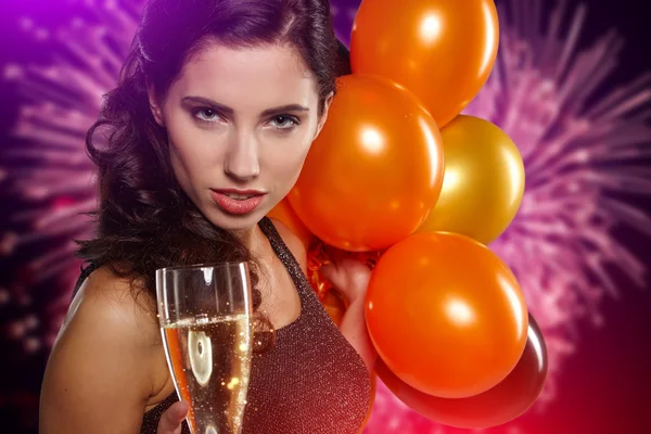 Woman holding glass of champagne — Stock Photo, Image