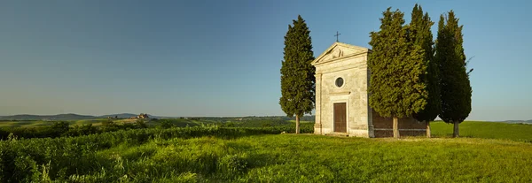 Chapel surrounded by cypress trees — Stock Photo, Image