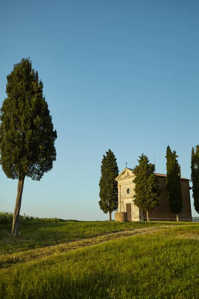 Chapel surrounded by cypress trees — Stock Photo, Image