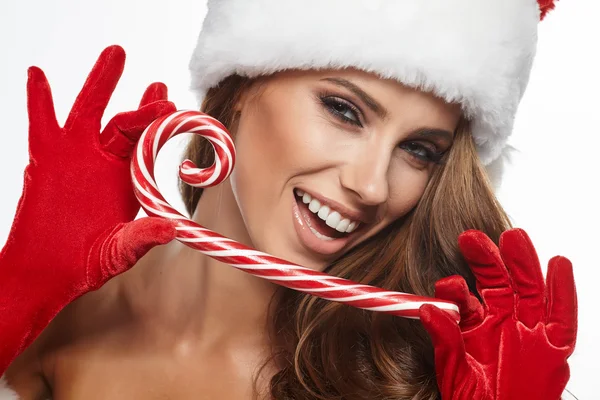 Noel kadın holding lolipop — Stok fotoğraf