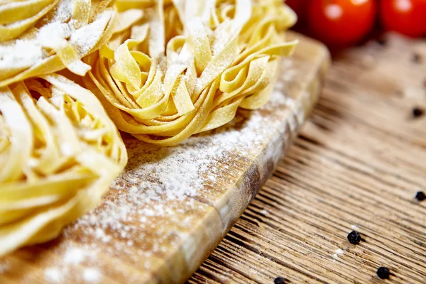 Homemade pasta and ingredients — Stock Photo, Image