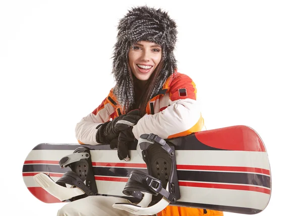 Žena v šatech snowboardista — Stock fotografie