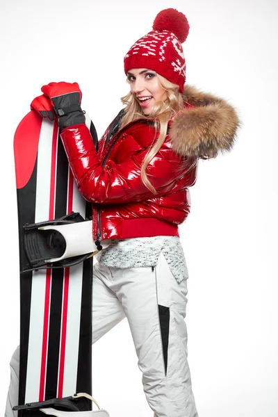 Žena v šatech snowboardista — Stock fotografie