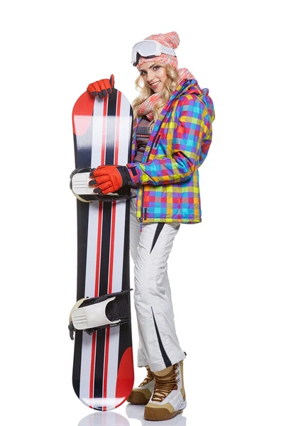 Жінка в костюмі сноубордиста — стокове фото