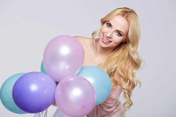 Mujer rubia con globos —  Fotos de Stock