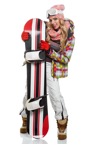 Женщина в сноубордерском костюме — стоковое фото