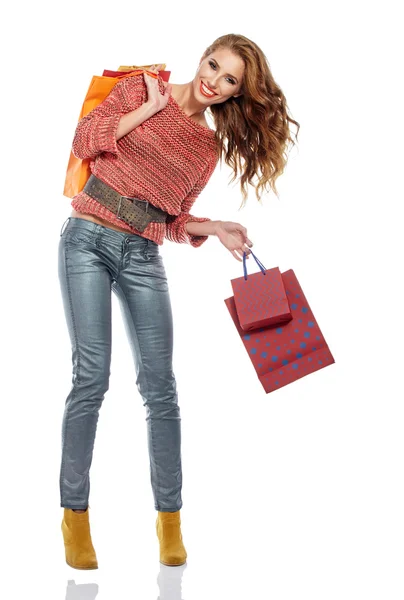 Woman wearing shopping bags — Stock Photo, Image