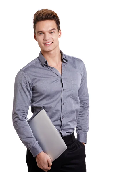 Uomo bello con computer portatile — Foto Stock
