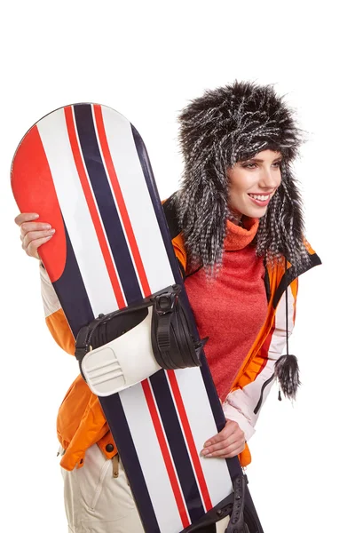 Woman standing with snowboard — Stock Photo, Image