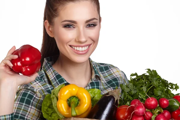 Молодая девушка с овощами — стоковое фото