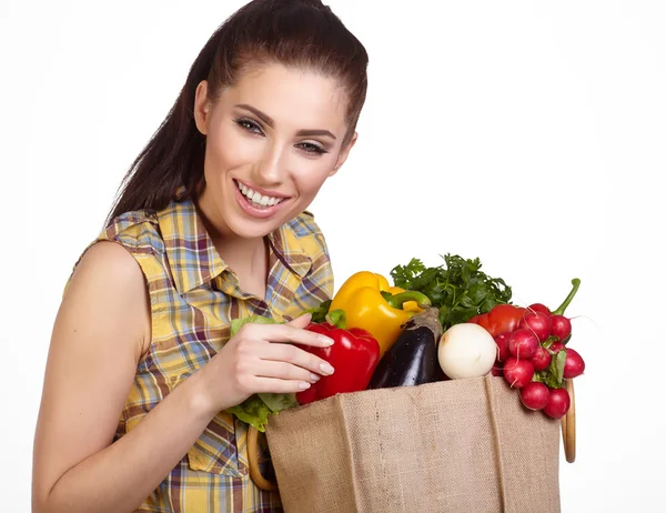 Jong meisje met groenten — Stockfoto