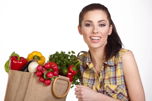 Mulher com alimentos frescos — Fotografia de Stock