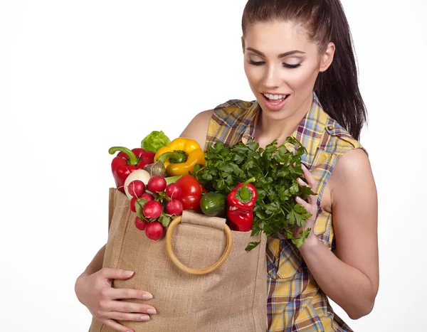 Ung flicka med grönsaker — Stockfoto