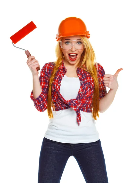 Funny girl in a helmet with roller in hand it is isolated on the — Stock Photo, Image