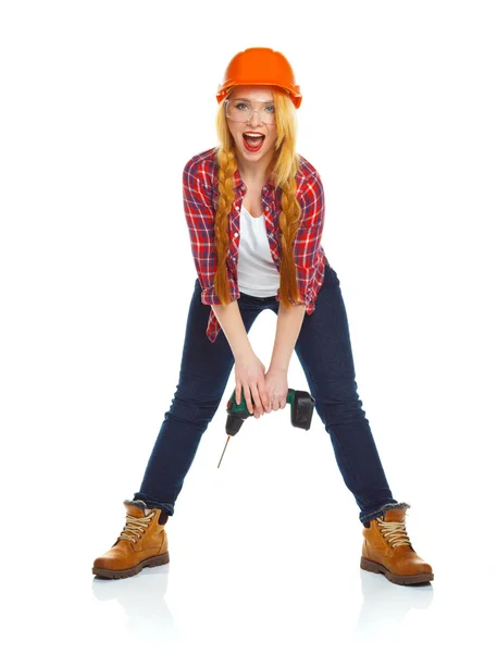 Kadın inşaat işçisi kask ile bir perforator — Stok fotoğraf