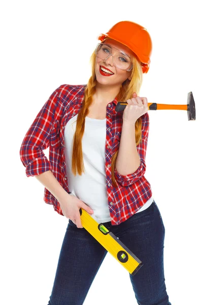 Młoda kobieta w hełm z narzędzi pracy na białym — Zdjęcie stockowe