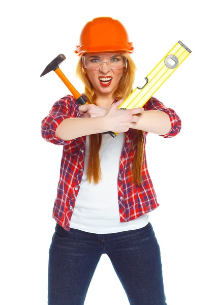 Jovem mulher no capacete com as ferramentas de trabalho em um branco — Fotografia de Stock