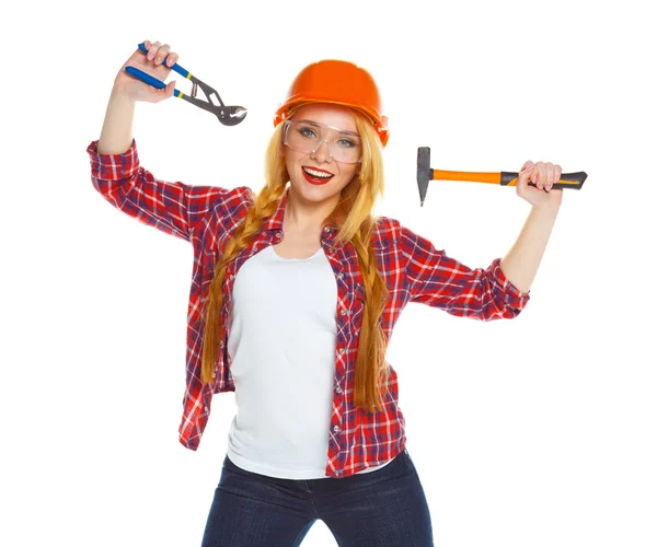 Young woman worker in helmet with the work tools on a white — Stock Photo, Image