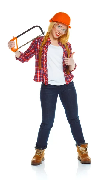 Young funny woman worker in helmet with a saw on a white — Stock Photo, Image