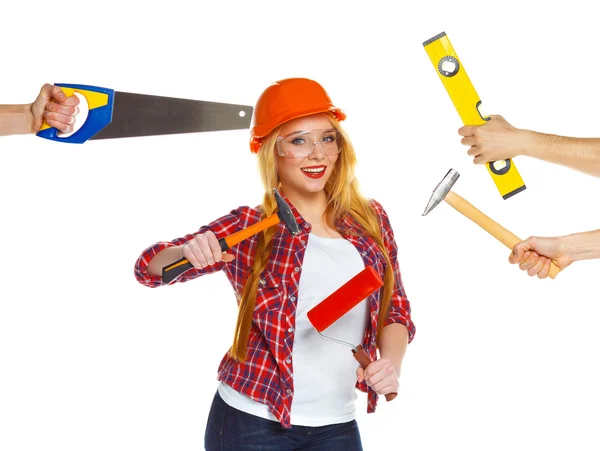 Cheerful girl builder and his hands around her with building too — Stock Photo, Image