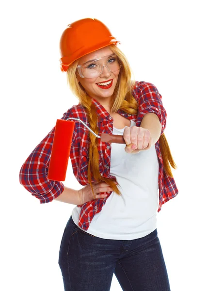 Engraçado feminino trabalhador contruction em um capacete com rolo na mão — Fotografia de Stock