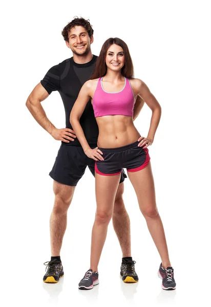 Casal atlético - homem e mulher depois do exercício de aptidão no branco — Fotografia de Stock